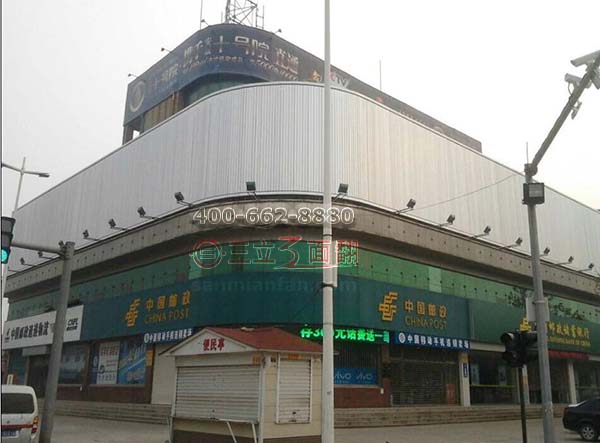 山东滨州博兴邮政局弧形转角三面翻广告牌案例施工图片