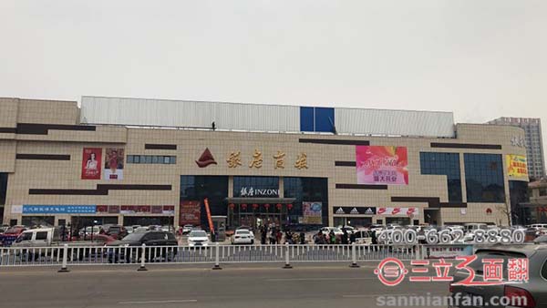 山东泰安市银座商场楼顶三面翻大型广告牌案例施工图片