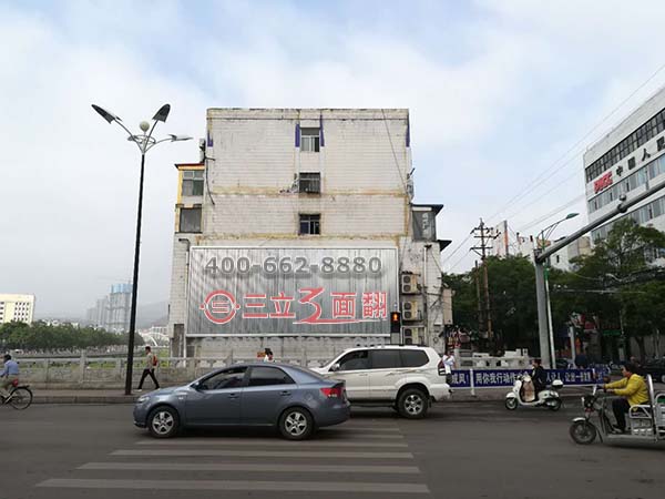 山西太原古交市室外墙体三面翻壁挂广告牌案例施工图片